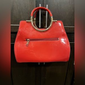Shiny red colored tote shoulder bag